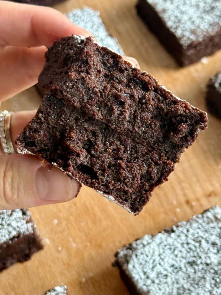 espresso brownies-brownie split in half showing close up of fudgy texture