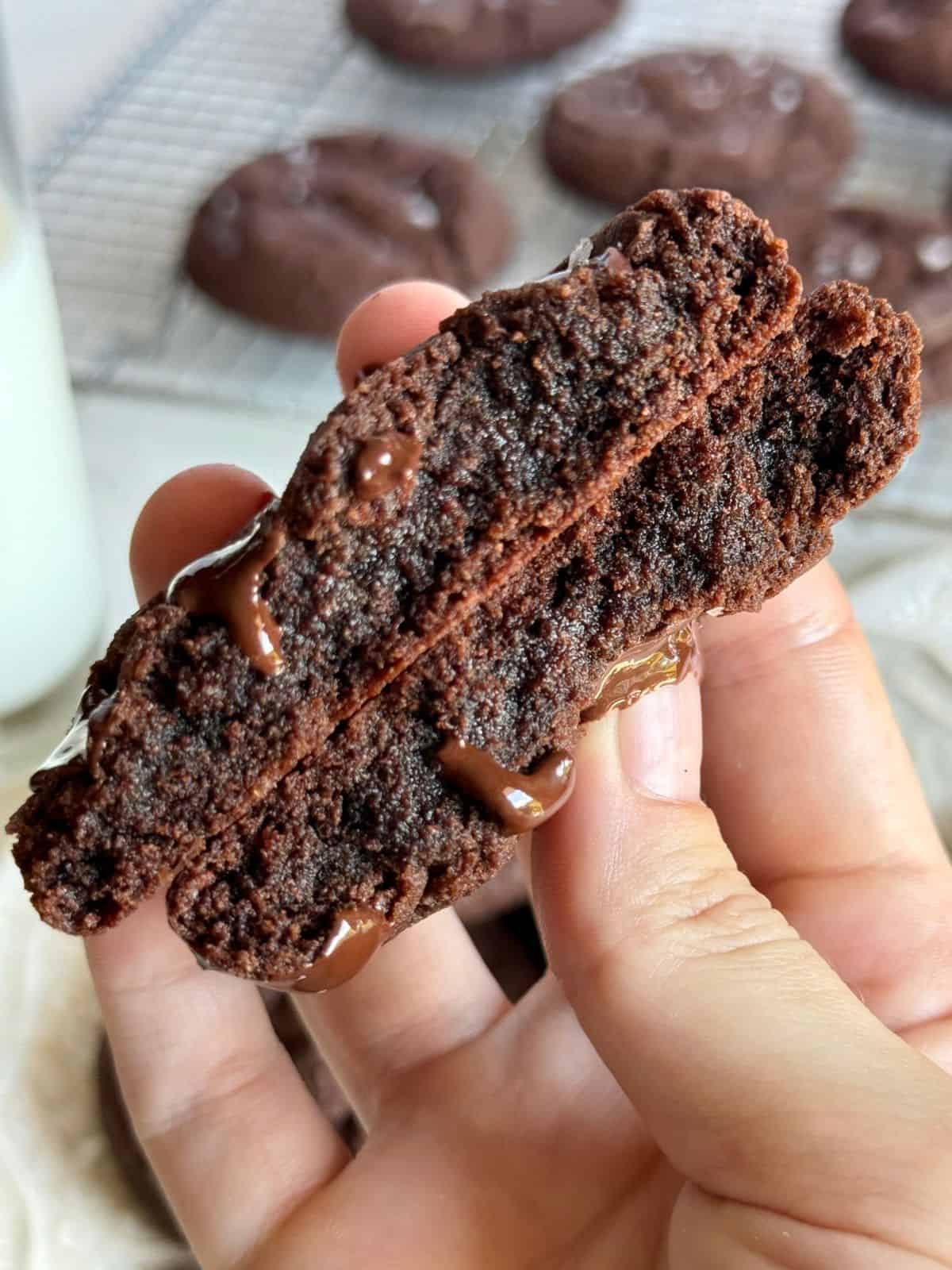 double dark chocolate cookies-close up of cookie split in half showing fudgy center