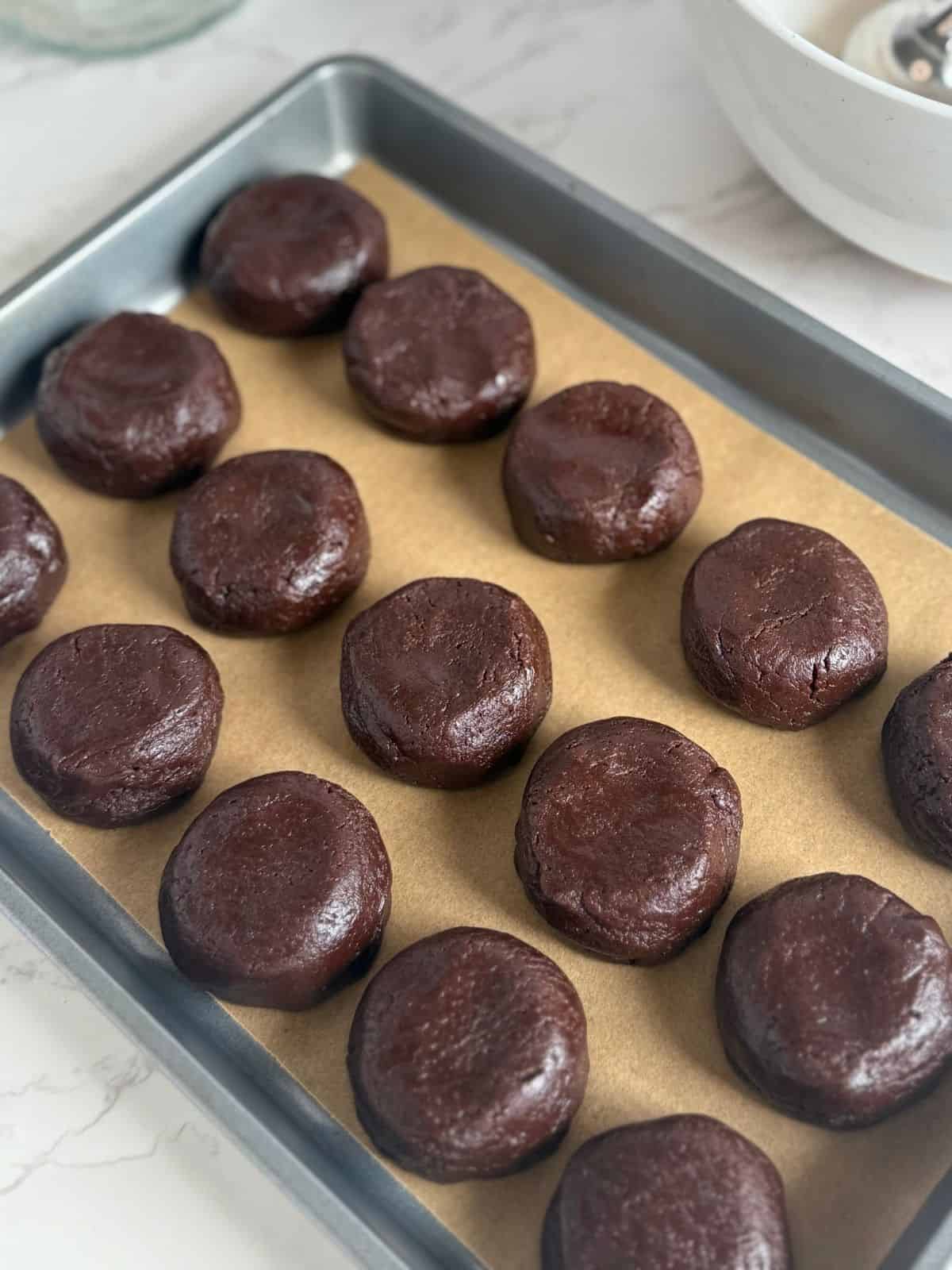 double dark chocolate cookies-cookies portioned on baking sheet