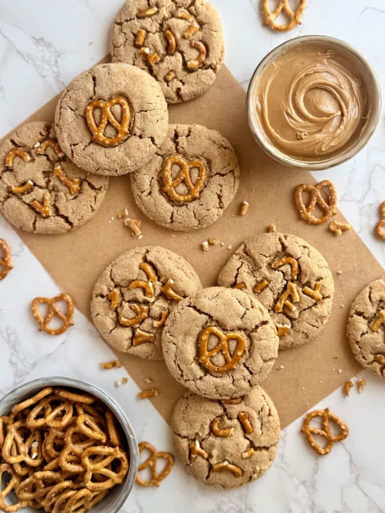 peanut butter pretzel cookies-OH cookies surrounded by pretzels and bowl of peanut butter in corner-feature image 