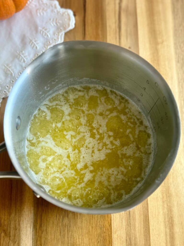 brown butter pumpkin cake-brown butter step 2-butter melted and bubbly in saucepan