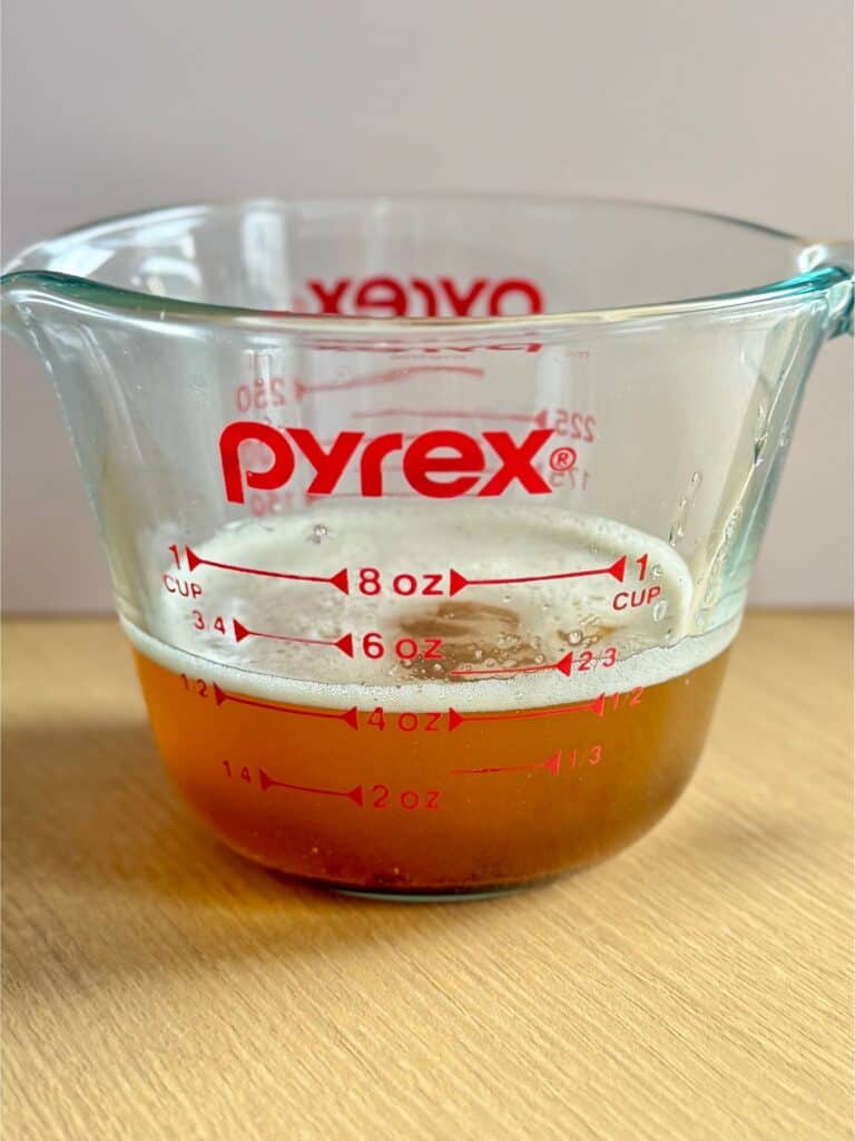 brown butter in measuring cup 